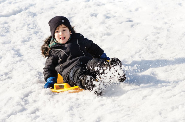 child sledding